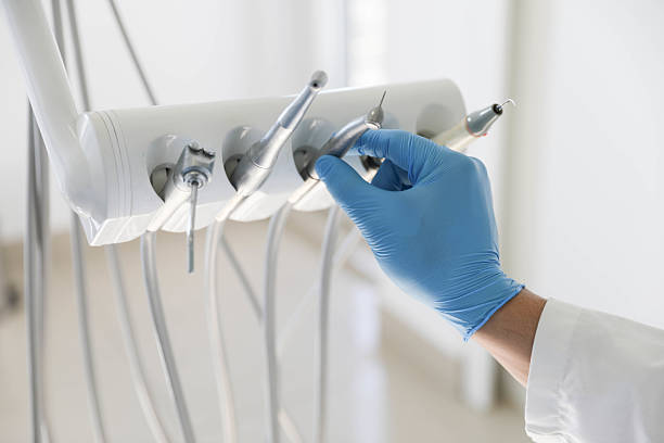 Professional Tooth Extraction technician working in Alma, AR